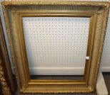 Heavily Carved Gold Frame