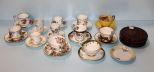 Twelve Cups and Saucers, One Saucer & Two Holders