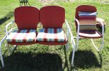 Red and White Metal Glider and Arm Chair