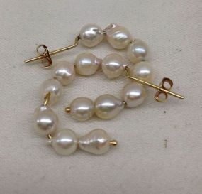 One Varied Earrings Unknotted, containing Fourteen Cultured Pearls
