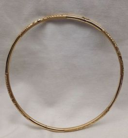 One Stamped 18KT Yellow Gold Lady's Cast and Hand Assembled 4mm Thick and 16