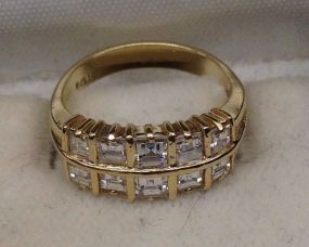 One Stamped 14KT Yellow Gold Lady's Cast Diamond Band