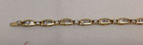 One Stamped 14KT Yellow Gold Lady's Cast Diamond Baguette Tennis Bracelet