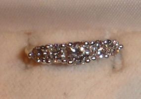 One Stamped 14KT Yellow Gold Lady's Cast 5 Diamond Band