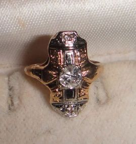 One Stamped 14KT Yellow Gold Lady's Cast Antique Diamond Ring