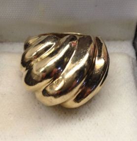 One 14KT Yellow Gold Lady's Cast Fancy Band