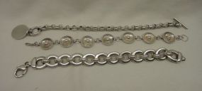 Three Sterling Lady's Charm and Link Bracelets