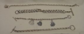 Four Sterling Lady's Charm and Link Bracelets
