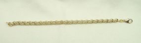 One stamped 14KT yellow gold lady's 7