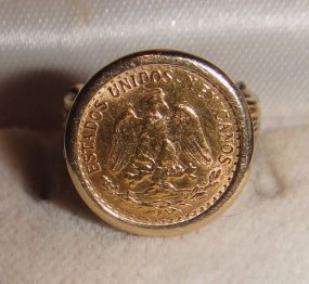 One 21KT and 14KT yellow gold lady's combination cast & die struck gold ring