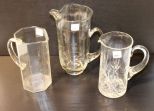 Three Glass Water Pitchers