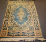 Blue and Crme Machine Made Rug