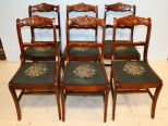 Six Mahogany Rose Carved Chairs