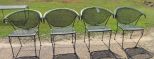 Four Wrought Iron Curved Back Chairs