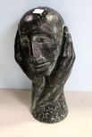 Plaster Statue of Head on Hands