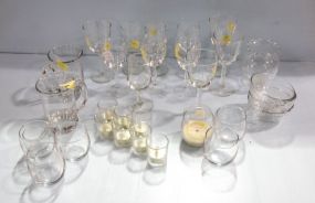 Group of Glasses and Glass Candleholders
