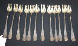 Set of Twelve Setling Cocktail Forks