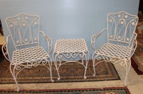 Pair of Wrought Iron Arm Chairs and Matching Table