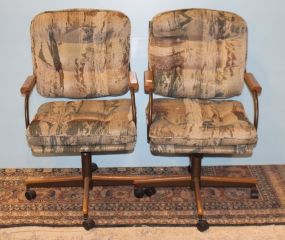 Pair of Rocking Swivel Arm Chairs