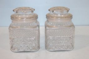 Two Clear Canisters