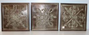 Three Metal Decorative Plaques