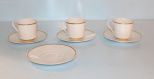 Three Cups, Four Saucers