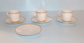 Three Cups, Four Saucers
