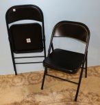 Two Folding Metal Chairs