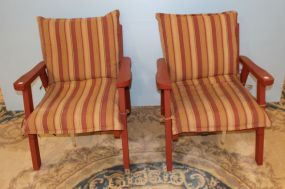 Two Wood Outdoor Chairs with Stripped Cushions