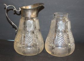 Two Cut Glass and Silverplate Pitchers