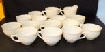 Thirteen Custard Glass Cups