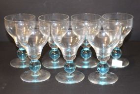 Seven Blue and Clear Glasses