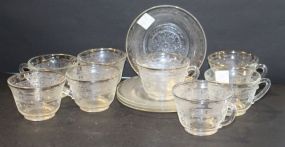 Eight Depression Cups, One Saucer, and Three Plates