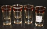 Four Clear and Cranberry Shot Glasses