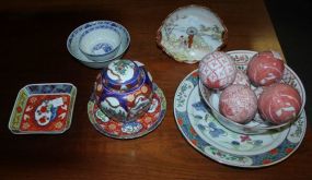 Fourteen Pieces of Porcelain Oriental Design Dishes, Jar, Bowls, Six Balls