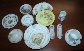 Groupling of Saucers, Two Bone Dishes, and Pair of Shoes