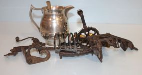 Two Iron Turn Tables, Trivet, Pewter Pitcher, Silverplate Toast Holder, Brass Lid, and Spoons