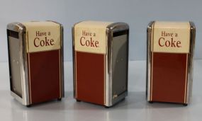 Three Coca- Cola Napkin Dispensers