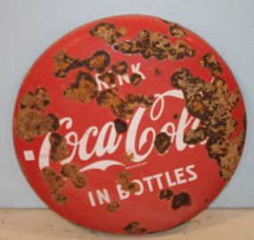 Worn Round Coke Sign