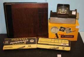 Airequipt Viewer, Kodak B-C Flash Holder, Flashbulbs, Photo Albums, and Two Polaroid Cameras