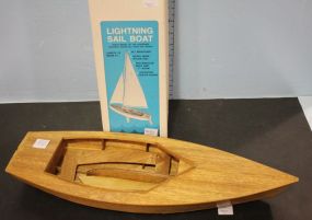 Lightning Sailboat and Wood Boat