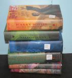 Group of Six Hard Back Harry Potter Books with Original Paper Covers