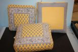 Three Powder Blue and Yellow Decorative Throw Pillows