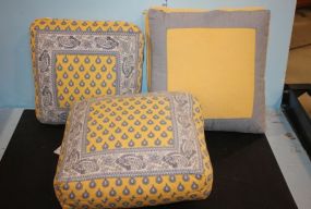Three Powder Blue and Yellow Decorative Throw Pillows