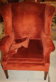 Wing Chair Covered in Valour Orange Fabric