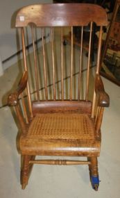 Early Spindle Back Rocker with Lace Cane Bottom