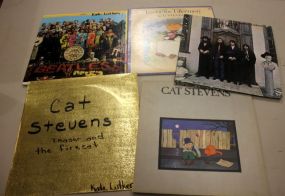 Five Albums One Sgt. Peppers album, one The Beatles Again album, one Tea for the Tillerman (Cat Stevens), and two Teaser and the Cat albums