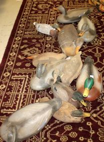 Eleven Plastic Duck Decoys