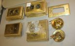 Thirty-four Pieces of Brass Wall Plates