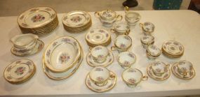 Fifty-eight Pieces of Castleton Rose by Castleton China Consisting of eight dinner plates, eight salad plates, five bread and butter plates, eight cups and saucers, eight demitasse cups and saucers, creamer, sugar, gravy, vegetable bowl, platter